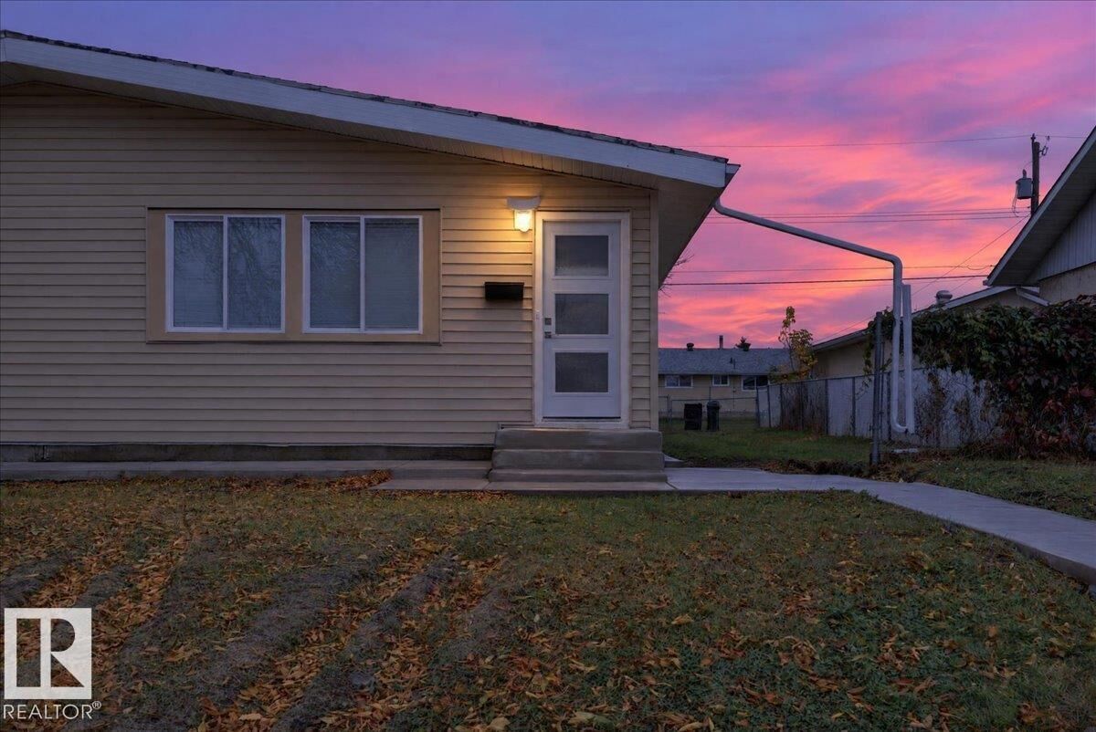 Property Photo:  13246 59 St NW  AB T5A 0R7 