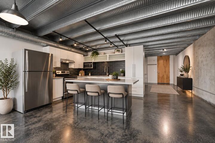 Property Photo:  10309 107 Street NW 130  AB T5J 1K3 