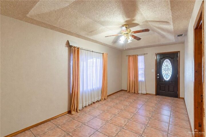 Property Photo:  409 Naranjo Street  TX 78572 