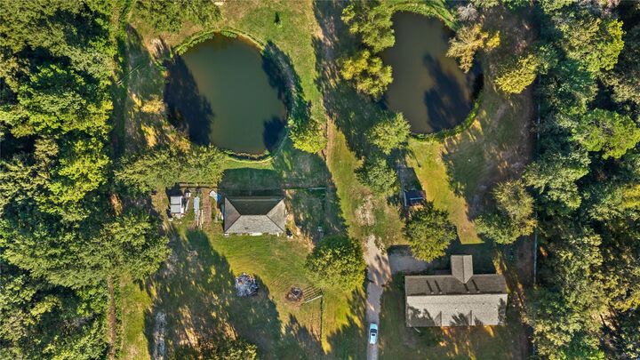 Property Photo:  448 County Road 2235  TX 77327 