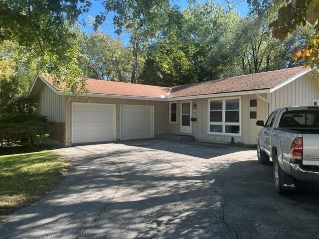Property Photo:  3501 Woodbury Street  MO 64055 