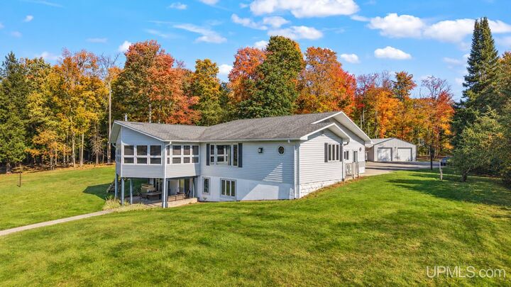 Property Photo:  N3793 Peninsula Point Road  MI 49862 