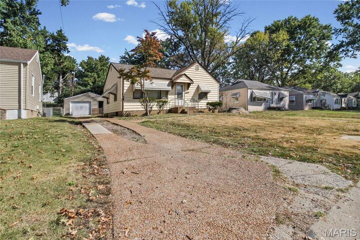 Property Photo:  7839 Underhill Drive  MO 63133 