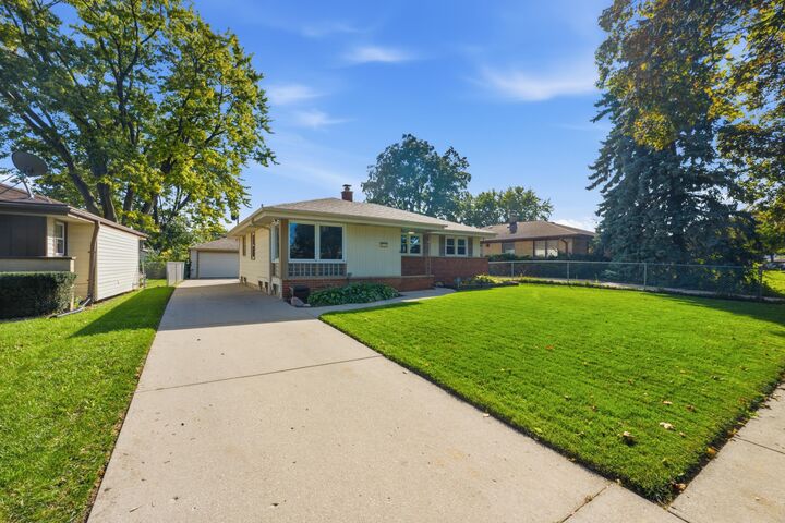Property Photo: 8725 W Palmetto Ave WI 53225