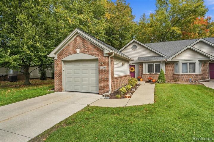 Property Photo:  21296 Juniper Court 73  MI 48336 