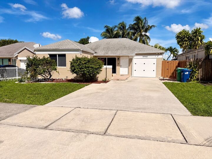 Property Photo:  19941 NW 32nd Ave  FL 33056 