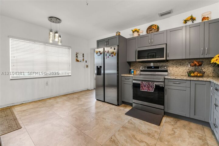 Property Photo:  550 NW 107th St  FL 33168 