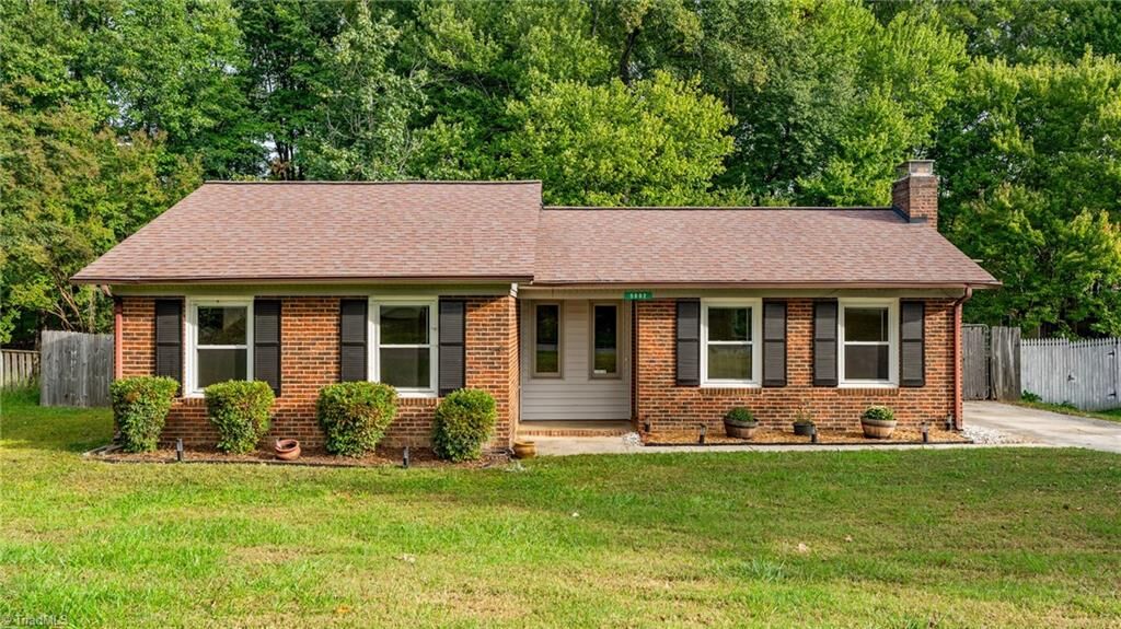 Property Photo: 5002 Carolwood Drive NC 27407