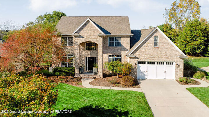 Property Photo:  5561 Wild Iris Lane  MI 48840 
