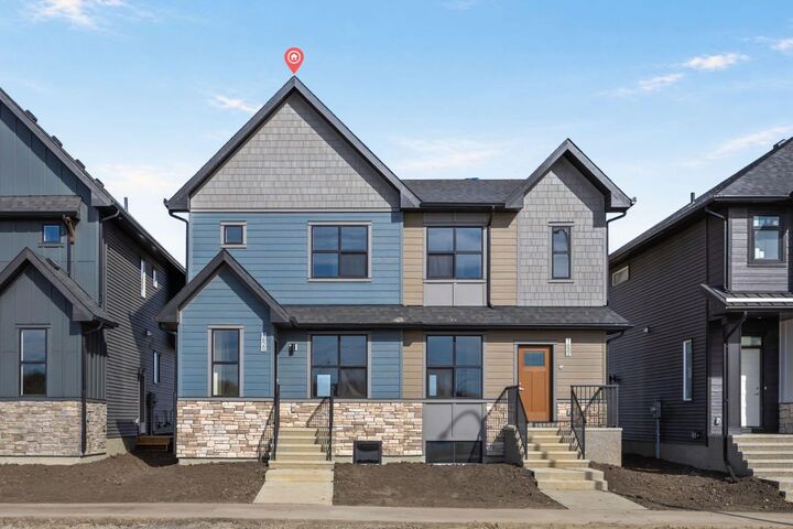Property Photo:  1628 Keystone Creek Avenue NE  AB T3P 2V3 
