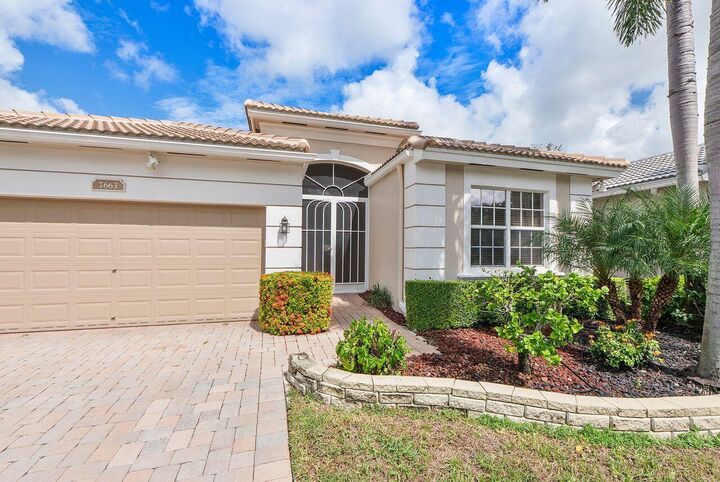 Property Photo: 7663 New Holland Way FL 33437