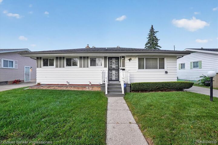 Property Photo:  2026 Mc Phail Street  MI 48503 