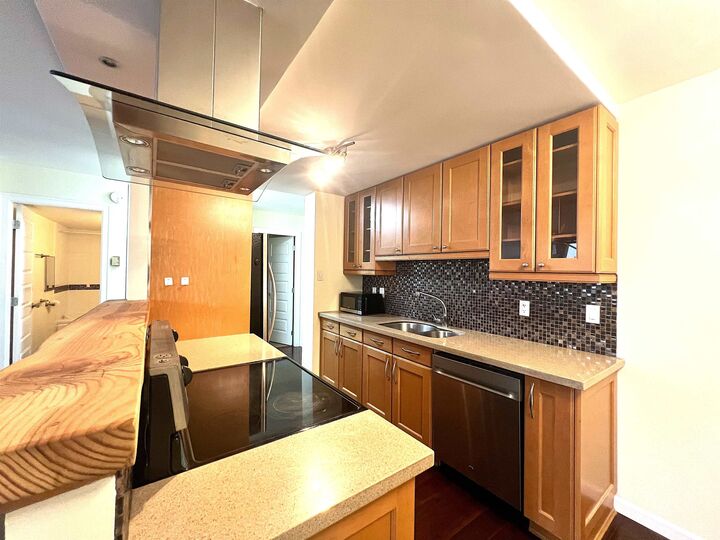 Property Photo:  4200 Mayberry Street 406  BC V5H 4A7 