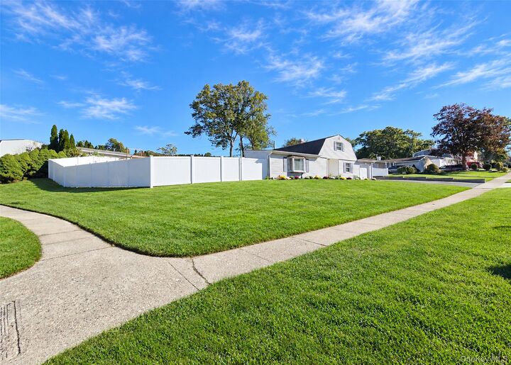 Property Photo: 1343 Waverly Avenue NY 11738