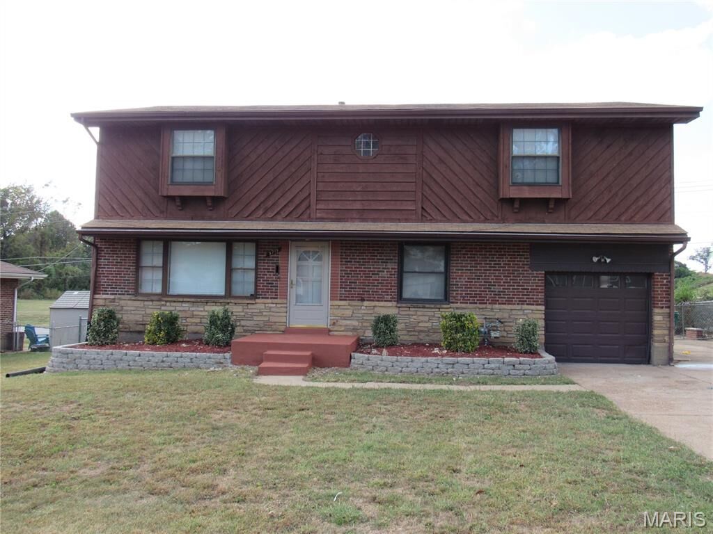 Property Photo:  9719 Durham Drive  MO 63137 