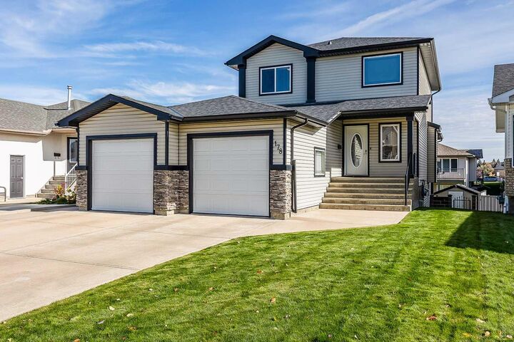 Property Photo:  178 Sunrise Road SW  AB T1B 4S1 