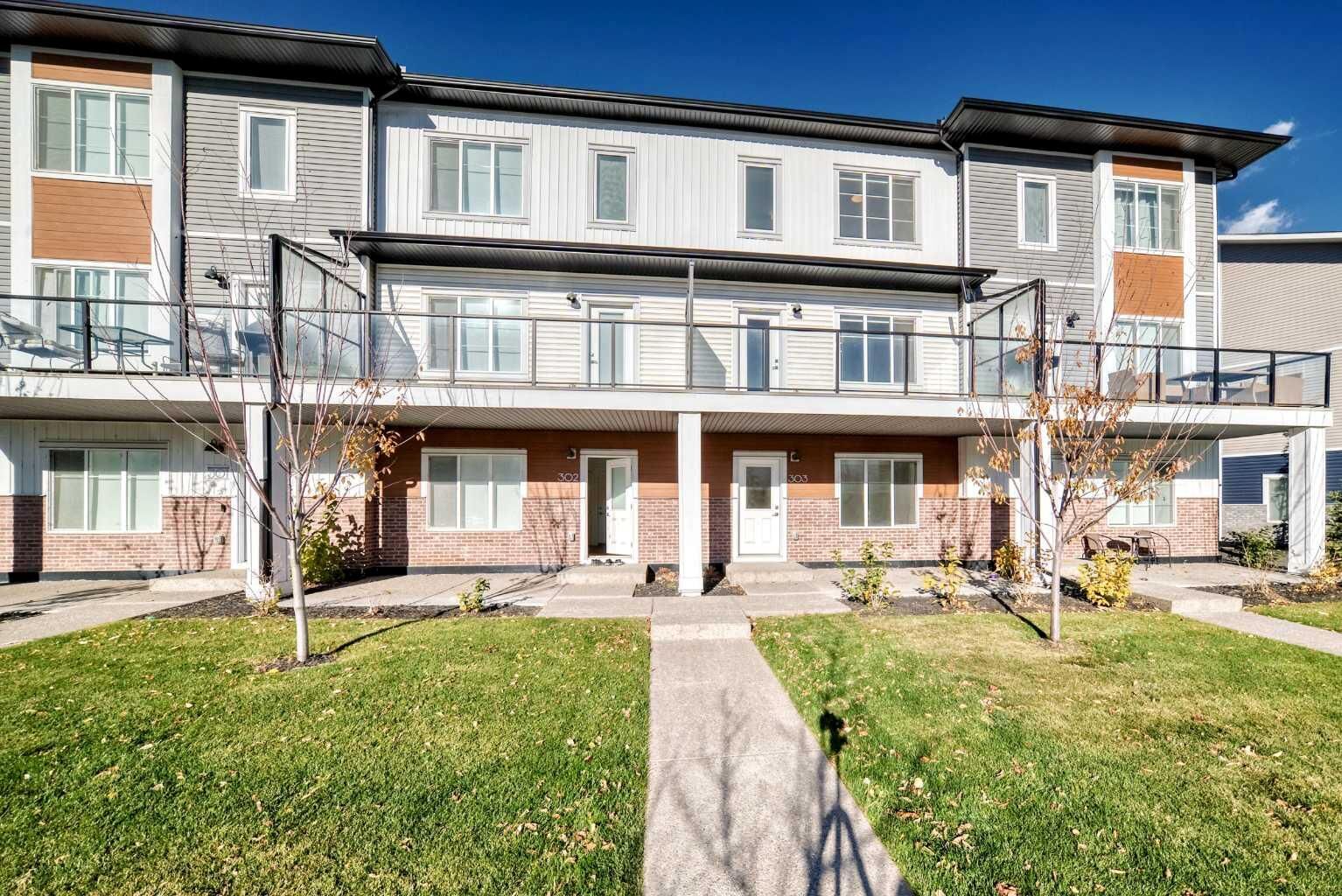 Property Photo:  6 Merganser Drive W 303  AB T1X 2Y2 