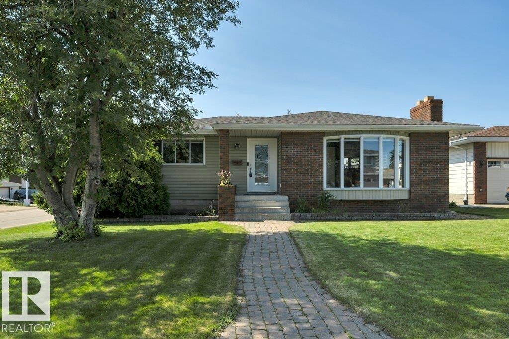 Property Photo:  6960 21 Av NW  AB T6K 2H4 