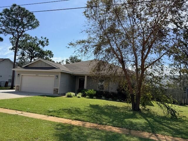 Property Photo:  8833 Cagle Drive  FL 32566 