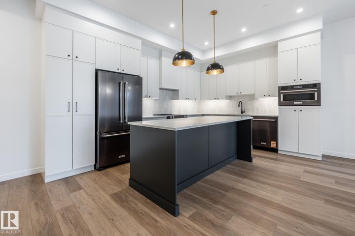Property Photo:  7459 May Common NW 104  AB T6R 0X6 