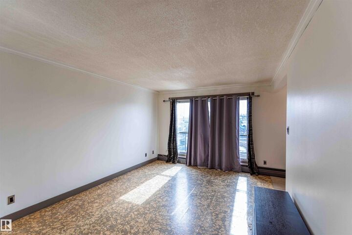 Property Photo:  10745 83 Avenue NW 302  AB T6E 2E5 