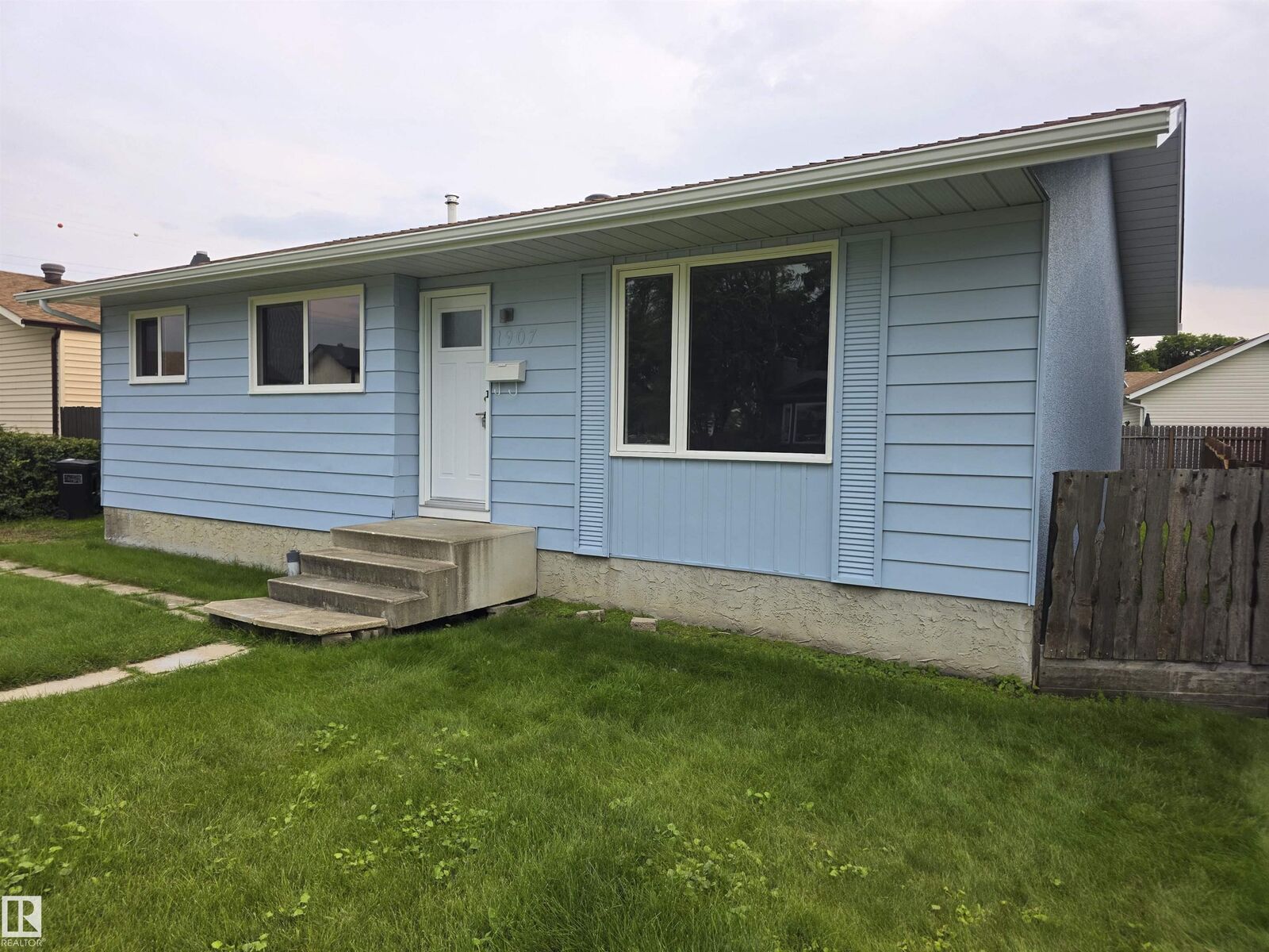 Property Photo:  1907 145A Avenue NW  AB T5Y 1S9 