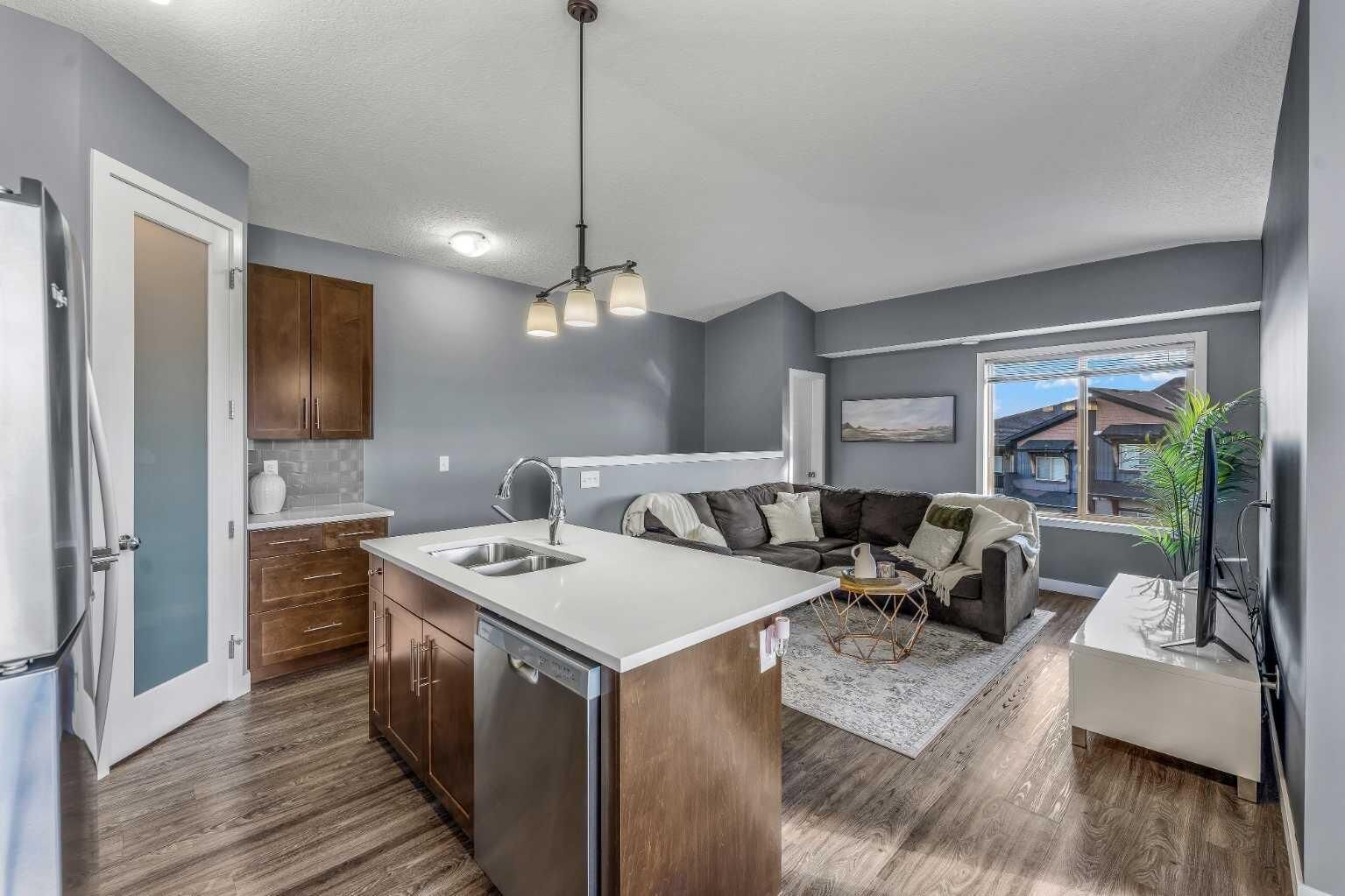 Property Photo: 2461 Baysprings Link SW 1324 AB T4B 4C6