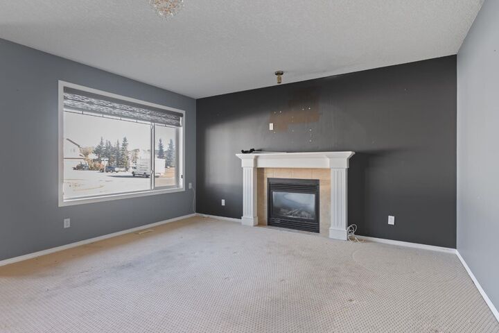 Property Photo:  23 Saddlecrest Way NE  AB T3J 5N7 