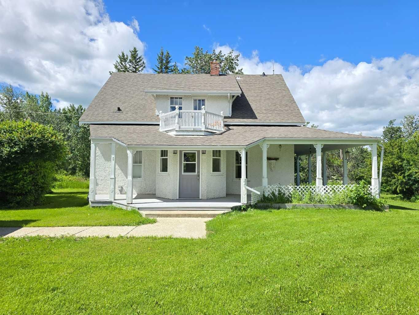 Property Photo:  240069 Township Road 834  AB T0H 1W0 