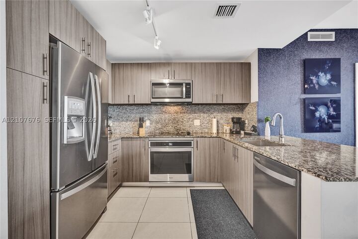 Property Photo:  5350 NW 84th Ave 1004  FL 33166 