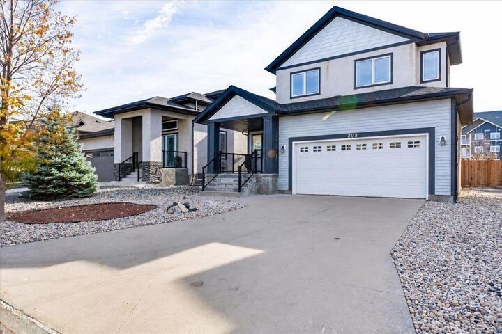 Property Photo:  208 Bellflower Road  MB R3Y 0H9 