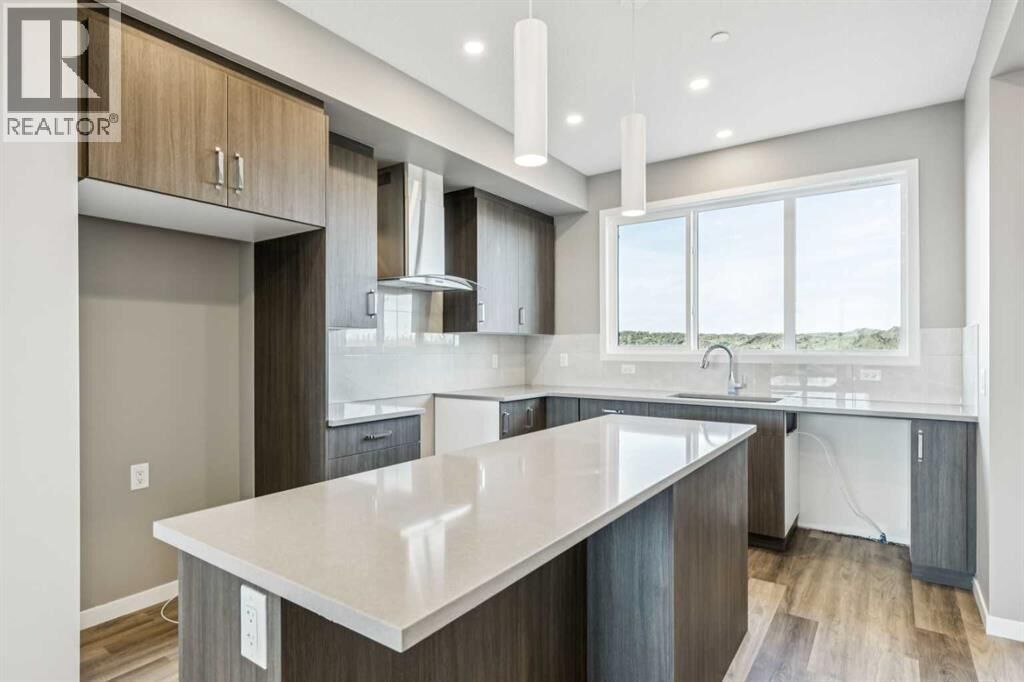 Property Photo:  205 Hotchkiss Road Southeast  AB T3S 0T9 