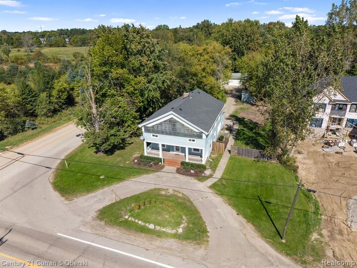 Property Photo:  51390 7 Mile Road  MI 48167 