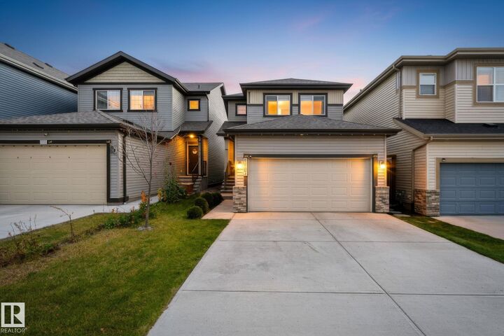 Property Photo:  9507 228 Street NW  AB T5T 7H5 