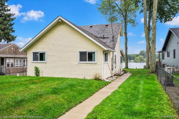 Property Photo: 733 Lakeshore Drive MI 48421
