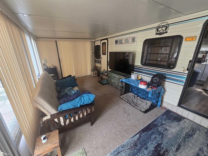 Property Photo:  10001 E Goodall Road 24  MI 48429 