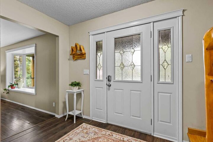 Property Photo:  352056 Pine Ridge Drive W  AB T0L 0K0 