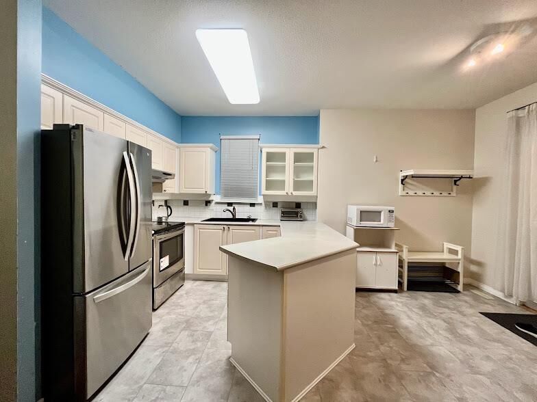 Property Photo:  14852 57B Avenue  BC V3S 8W5 