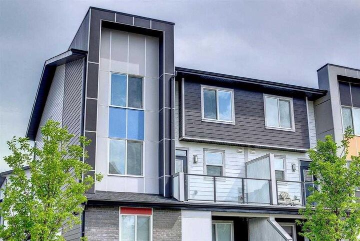 Property Photo:  245 Redstone  NE 203  AB T3N 1M6 