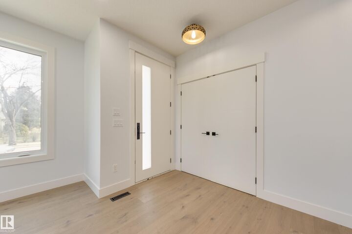Property Photo: 10954 135 Street NW AB T5M 1K2