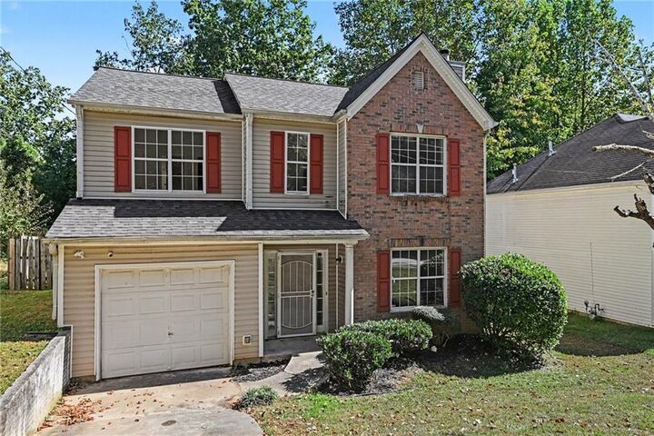 Property Photo:  7102 Shenandoah Trail  GA 30168 