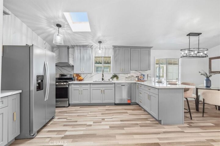 Property Photo:  9080 Bloomfield Avenue 153  CA 90630 