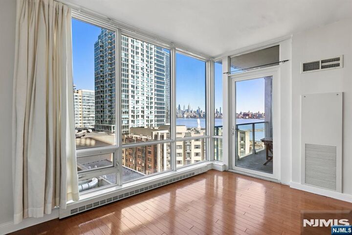 Property Photo: 20 Newport Parkway 1209 NJ 07310