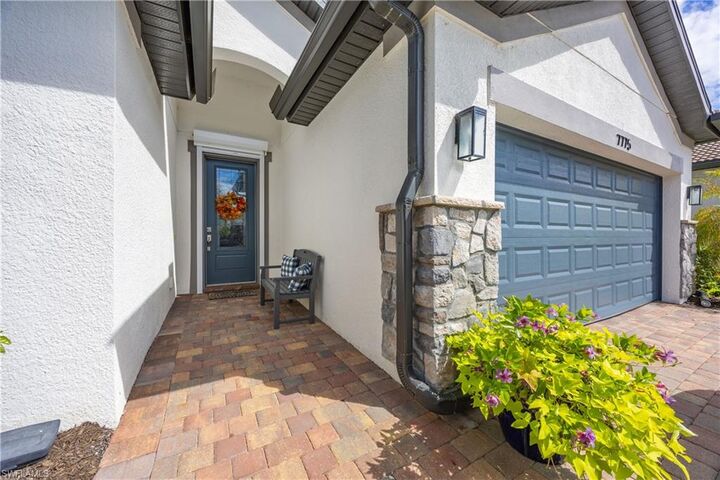 Property Photo:  7775 Winding Cypress Dr  FL 34114 