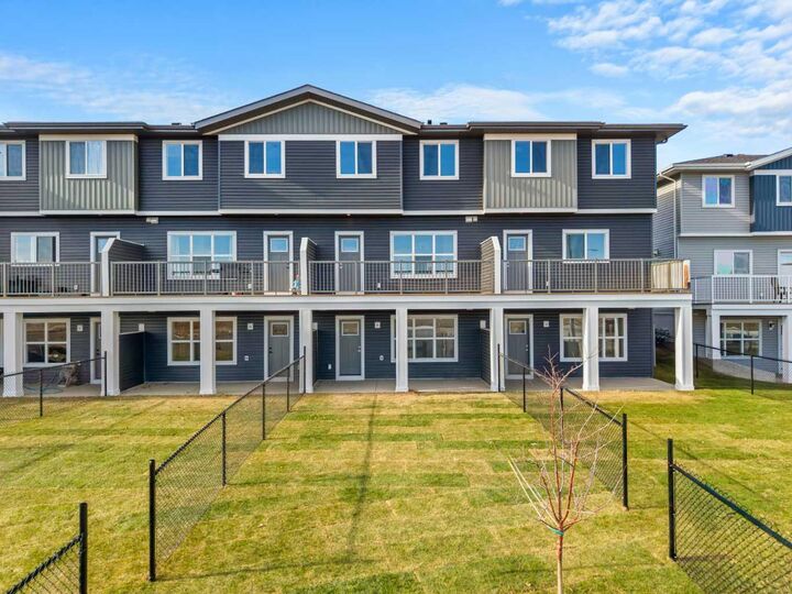 Property Photo: 525 River Heights Drive 1505 AB T4C 3E4
