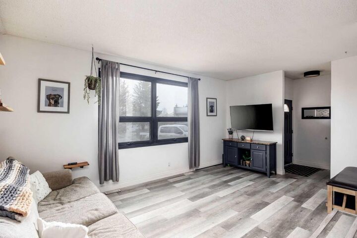 Property Photo: 203 Cochrane Crescent AB T9K 1H1