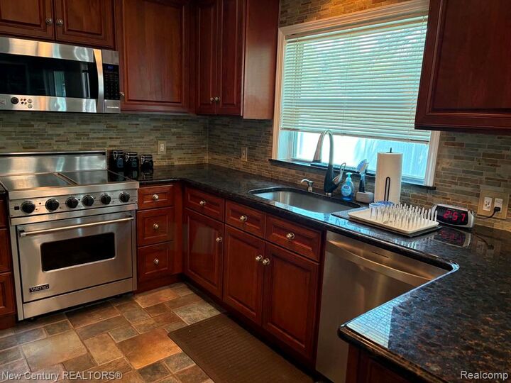 Property Photo:  12831 Northfield Boulevard  MI 48237 