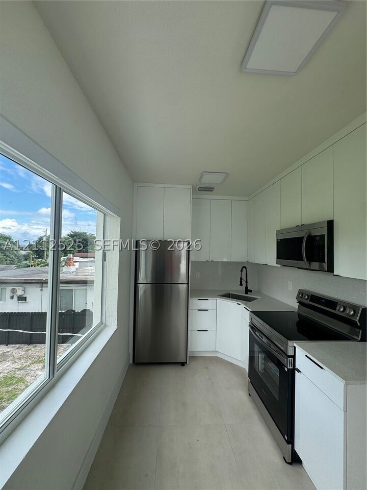 Property Photo:  351 E 14th St 353  FL 33010 