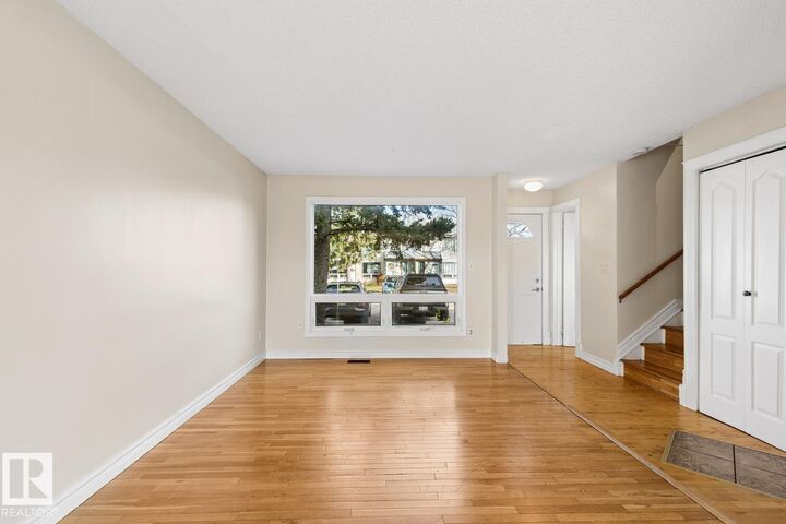 Property Photo:  14713 25 Street NW  AB T5Y 2E8 