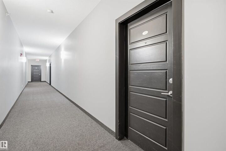 Property Photo:  14808 125 Street NW 312  AB T5X 0G1 